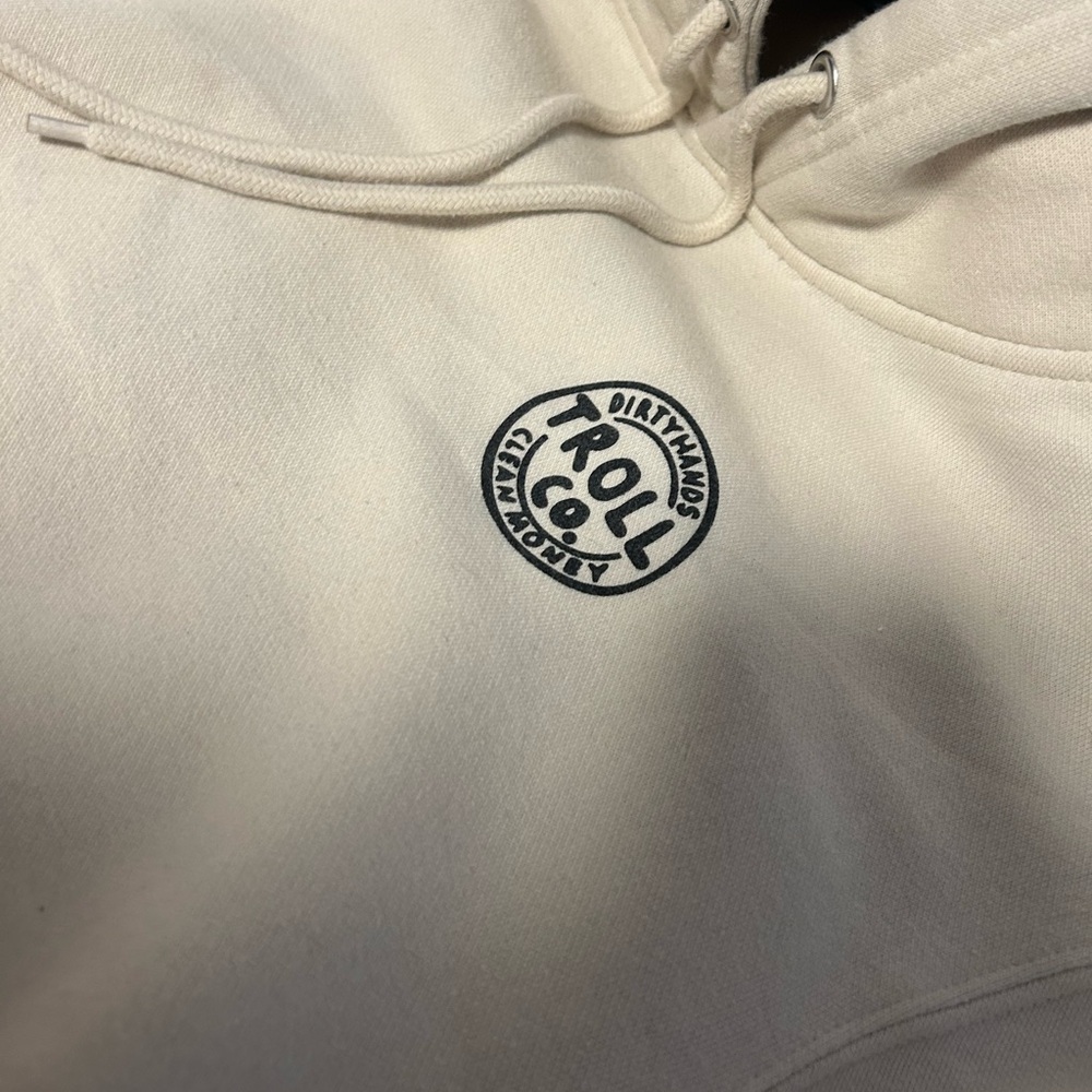 “ dirty hands troll co. clean money” cream hoodie